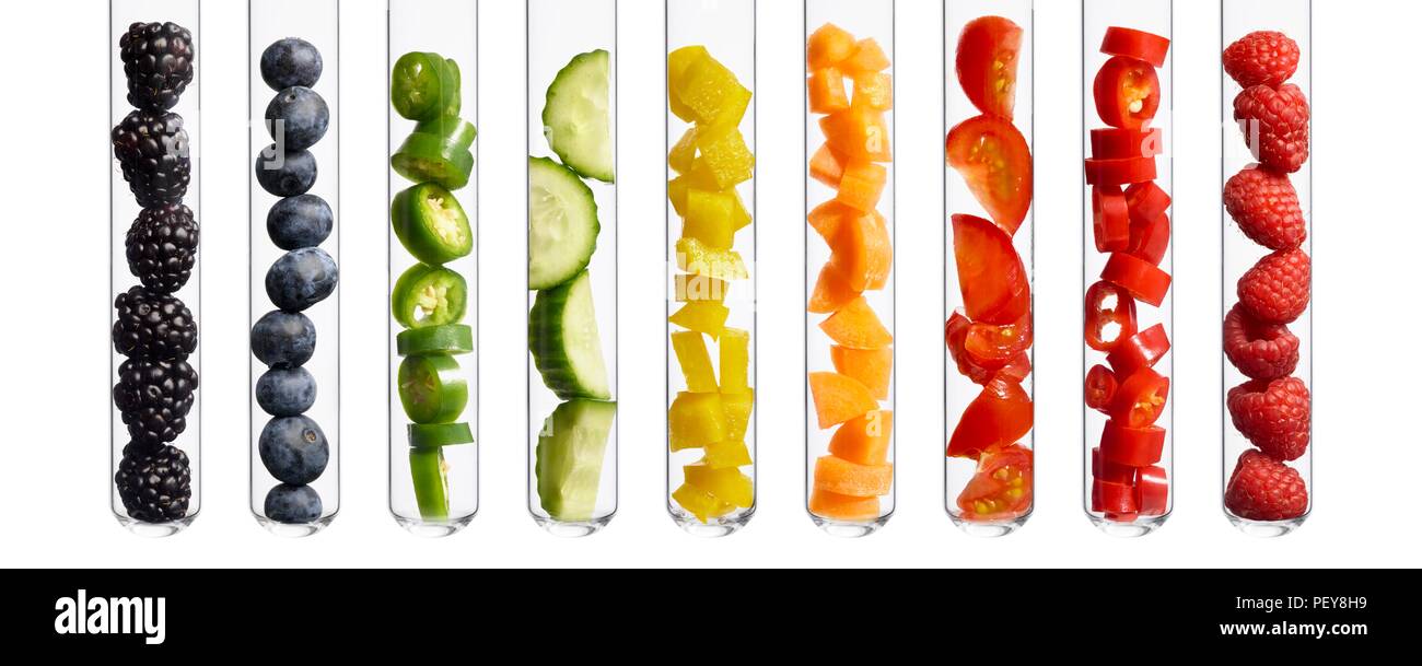 Fruits and vegetables in test tubes, studio shot Stock Photo Alamy