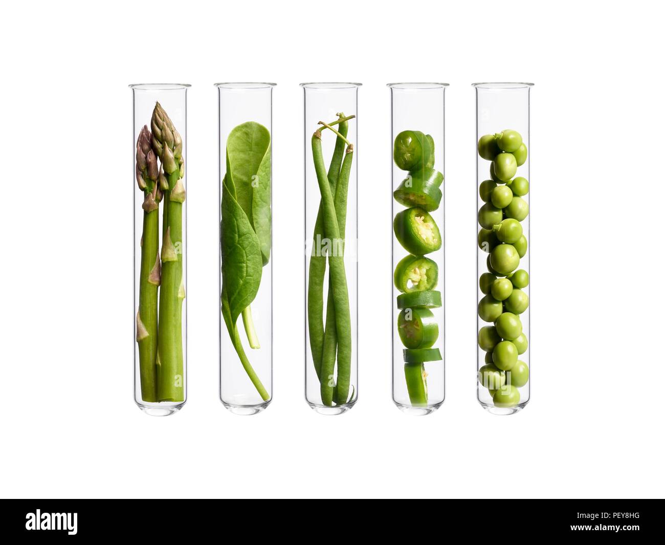 Vegetables in test tubes, studio shot Stock Photo - Alamy