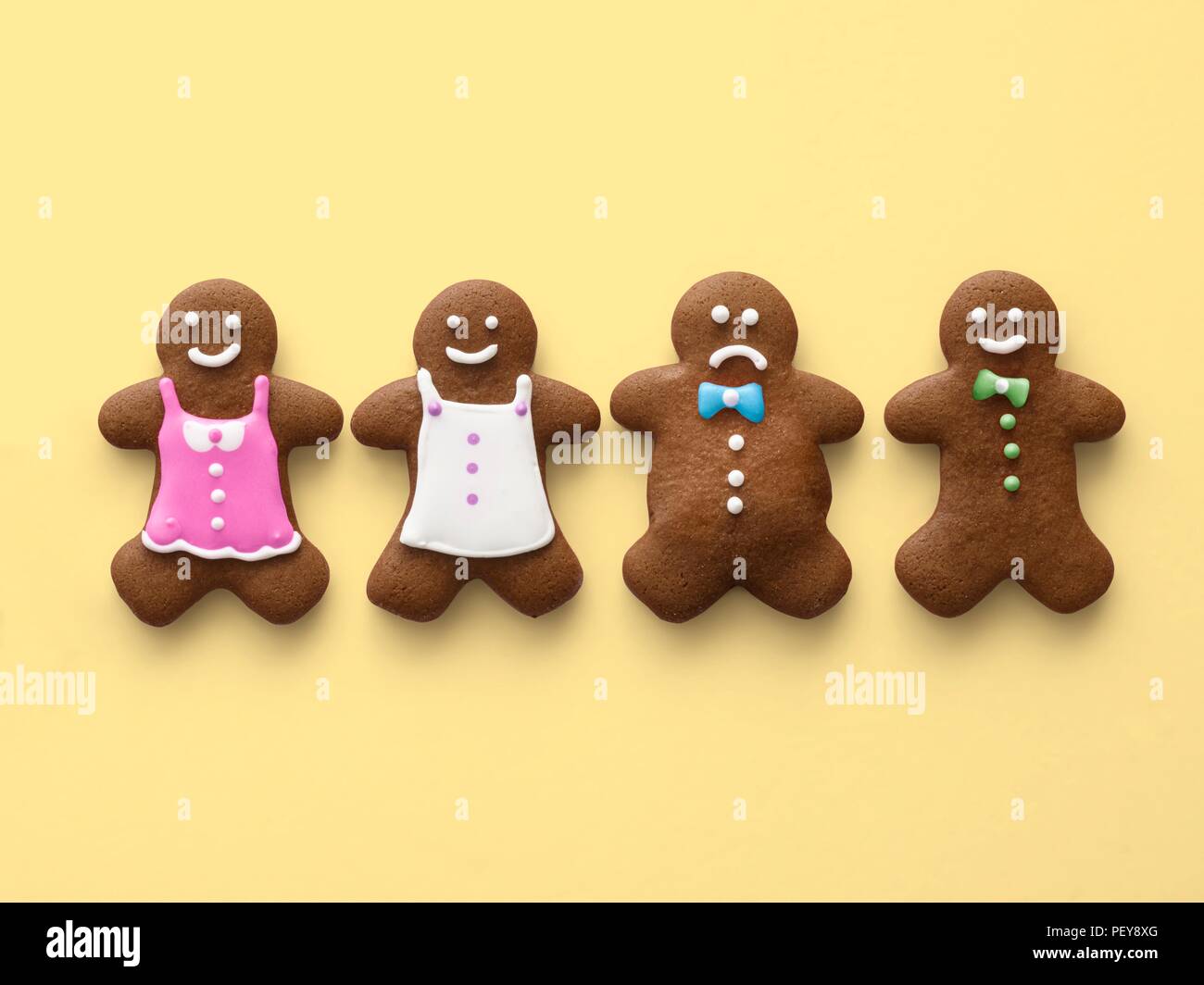 Four gingerbread men and women. Stock Photo