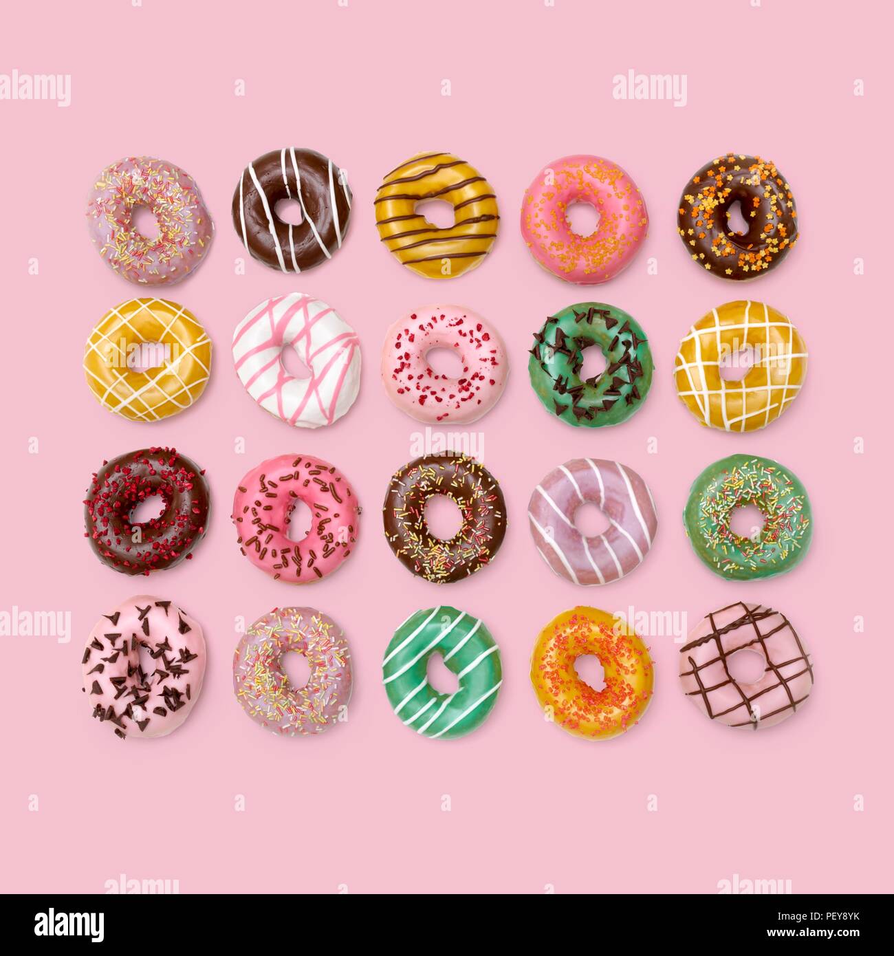 Colourful doughnuts, studio shot. Stock Photo