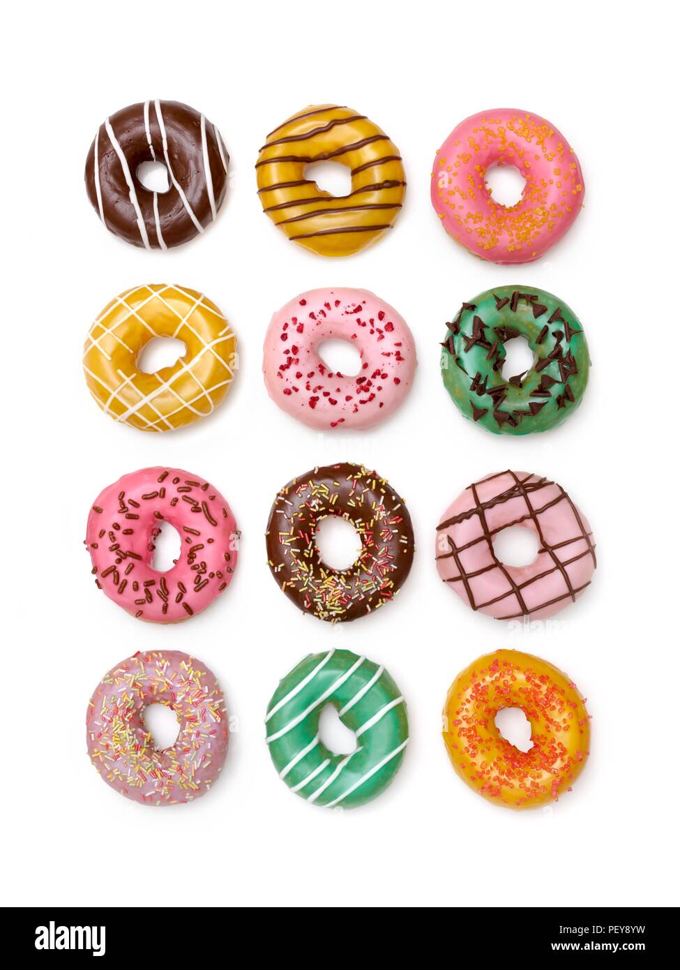 Colourful doughnuts, studio shot. Stock Photo