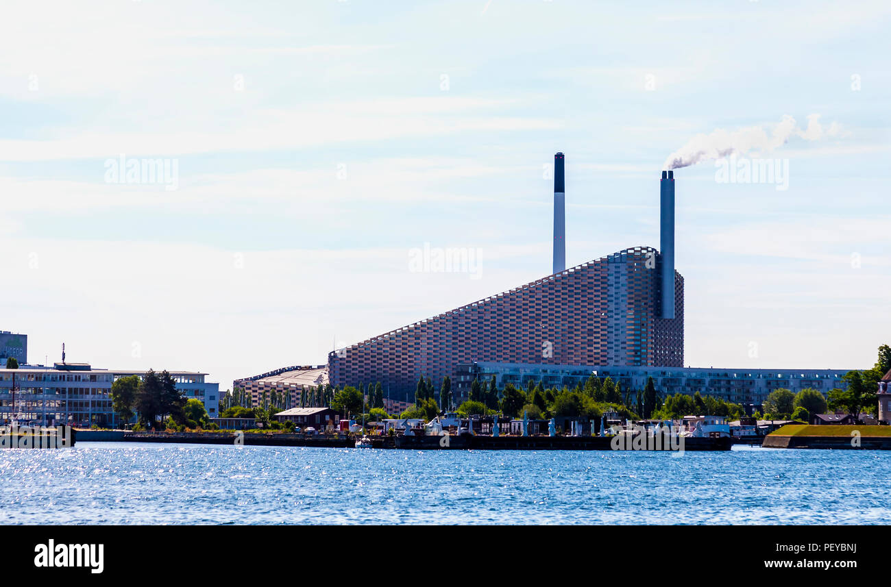 The Amager Bakke plant in Copenhagen, Denmark, doubles as a year-round artificial ski slope, hiking slope and climbing wall as it combines a heat and  Stock Photo
