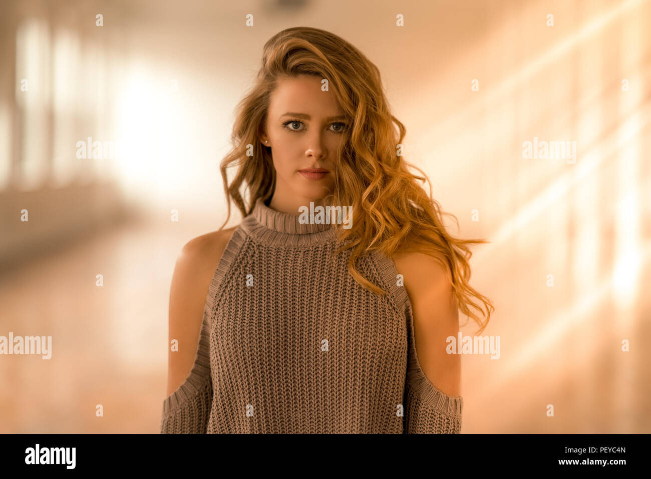 A woman makes eye contact while posing for a portrait Stock Photo Alamy