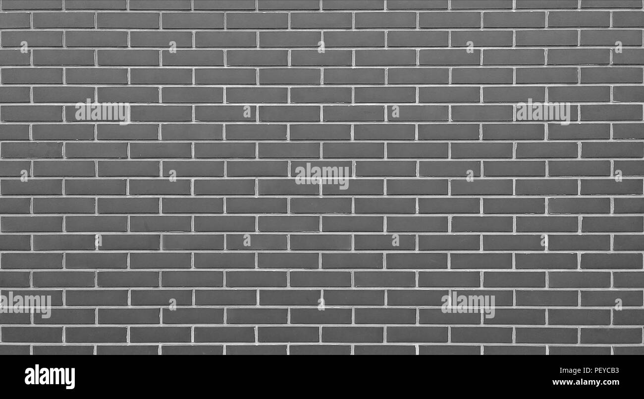 Empty gray brick wall textured background Stock Photo - Alamy