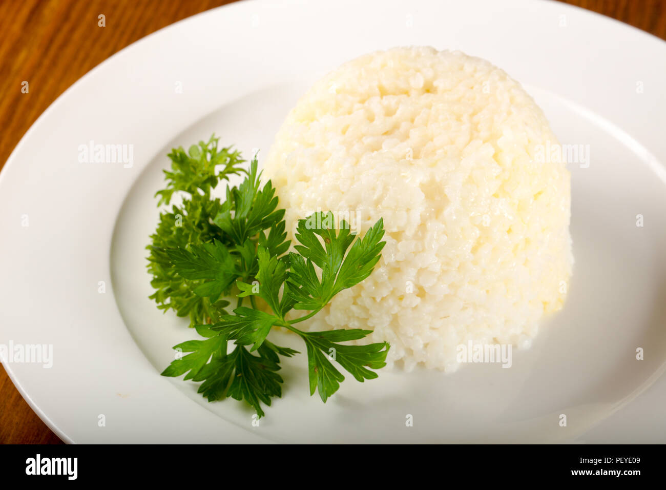 Steamed rice with parsley Stock Photo - Alamy