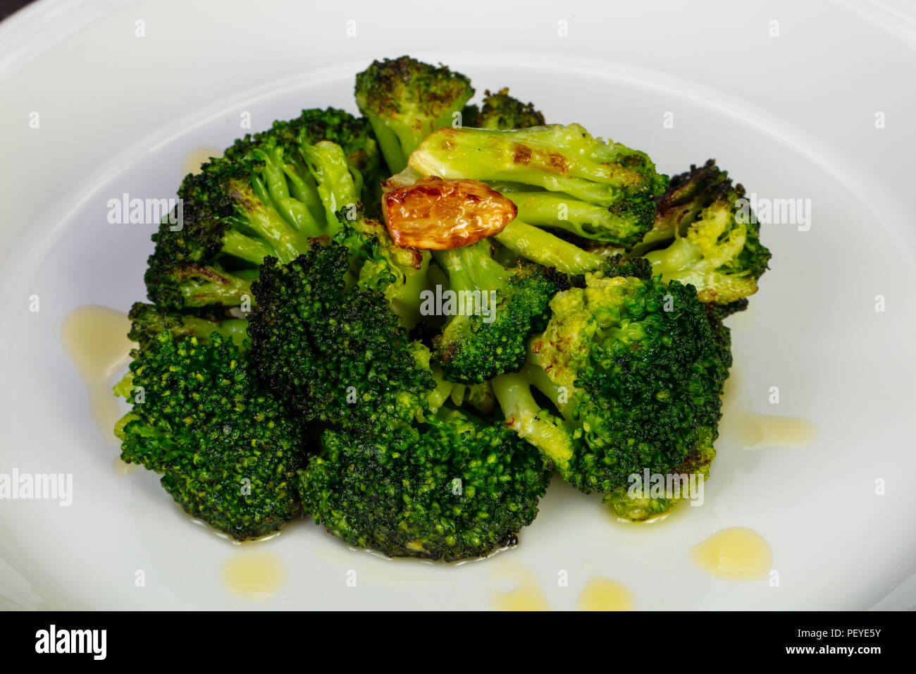 Tasty broccoli with olive oil Stock Photo Alamy