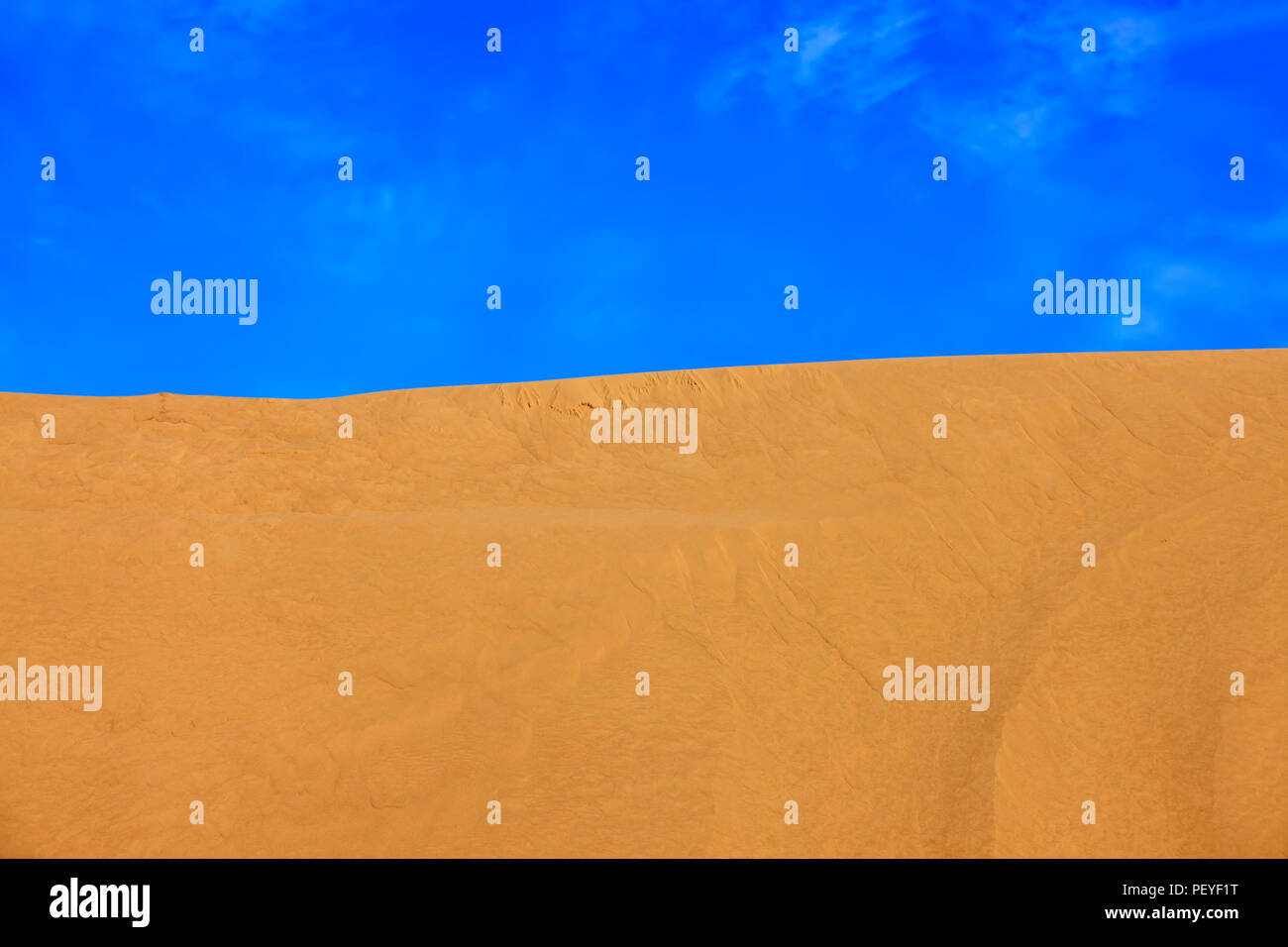 The desert under the blue sky Stock Photo - Alamy