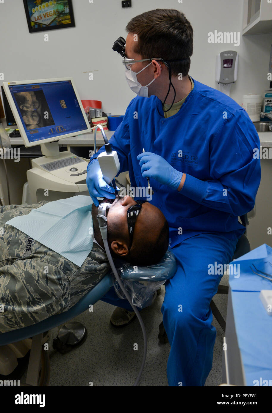 Capt. (Dr.) Derek Sloan, 2nd Dental Squadron general dentist, takes an
