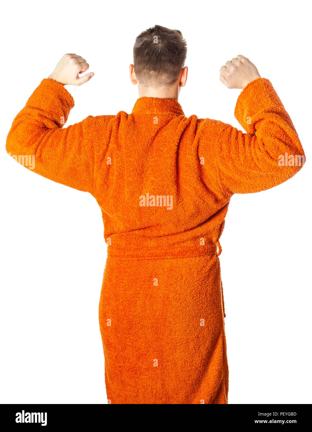 Young man posing in bathrobe after shower, back view Stock Photo Alamy