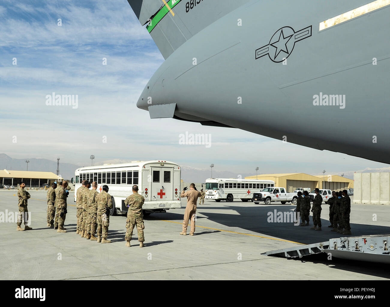 A 455th Expeditionary Medical Group team prepares to load a NATO ally, who required Extracorporeal Membrane Oxygenation team support, onto an aeromedical evacuation transport at Bagram Air Field, Afghanistan, on Feb. 18, 2016. The ECMO team, dispatched from San Antonio Military Medical Center, uses technology that bypasses the lungs and infuses the blood directly with oxygen, while removing the harmful carbon dioxide from the blood stream. The patient was airlifted to Landstuhl Regional Medical Center, Germany, where he will receive 7 to 14 days of additional ECMO treatment. (U.S. Air Force ph Stock Photo