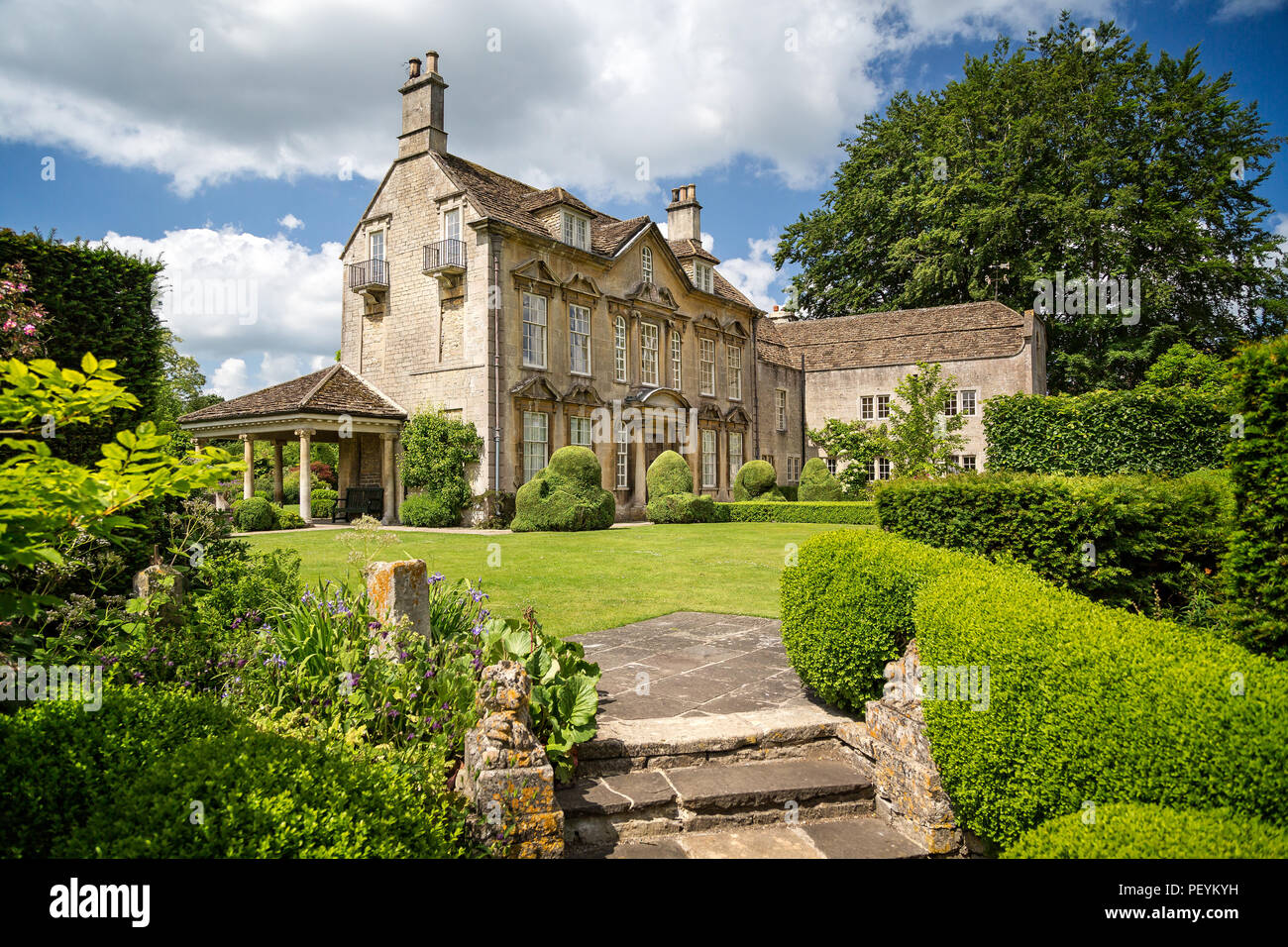 Arts & Crafts English Country Garden and manor house in Holt, Wiltshire, UK taken on 25 June