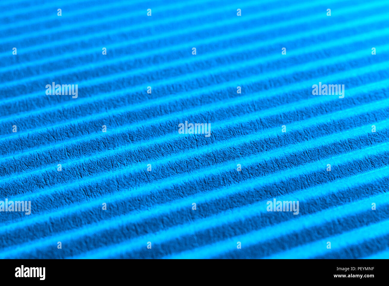 Blue corrugated cardboard closeup. Selective focus. Stock Photo