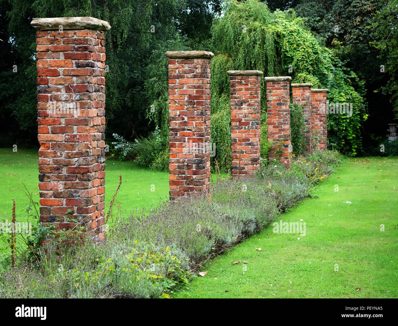 A victorian garden brick pergola. These these garden brick pillars are