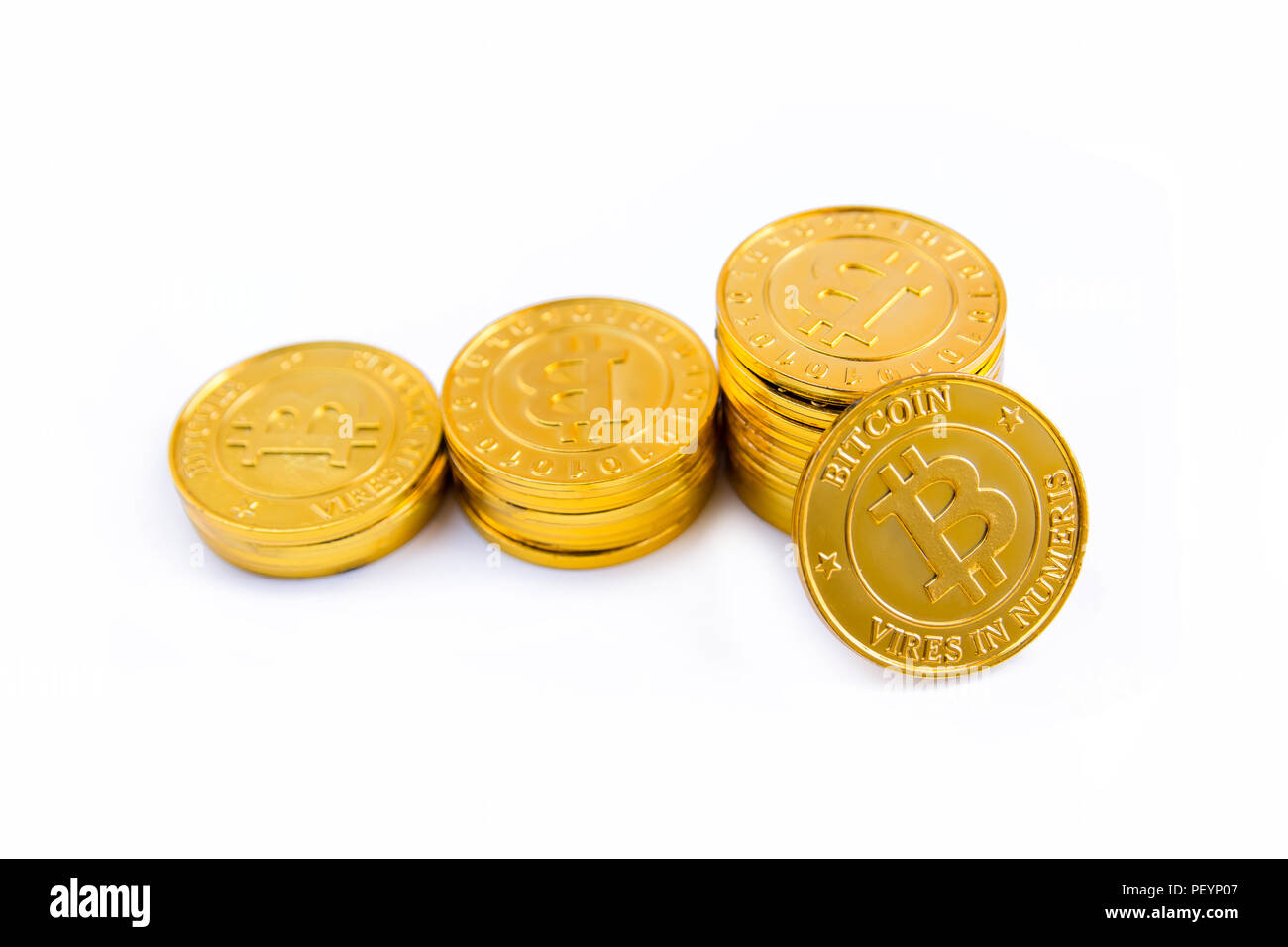Golden bitcoin coins stack. Isolated on white background with clipping ...