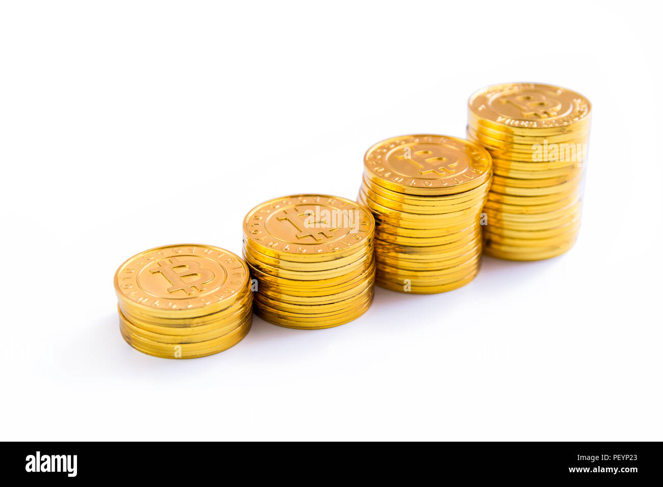 Golden bitcoin coins stack. Isolated on white background with clipping path Stock Photo