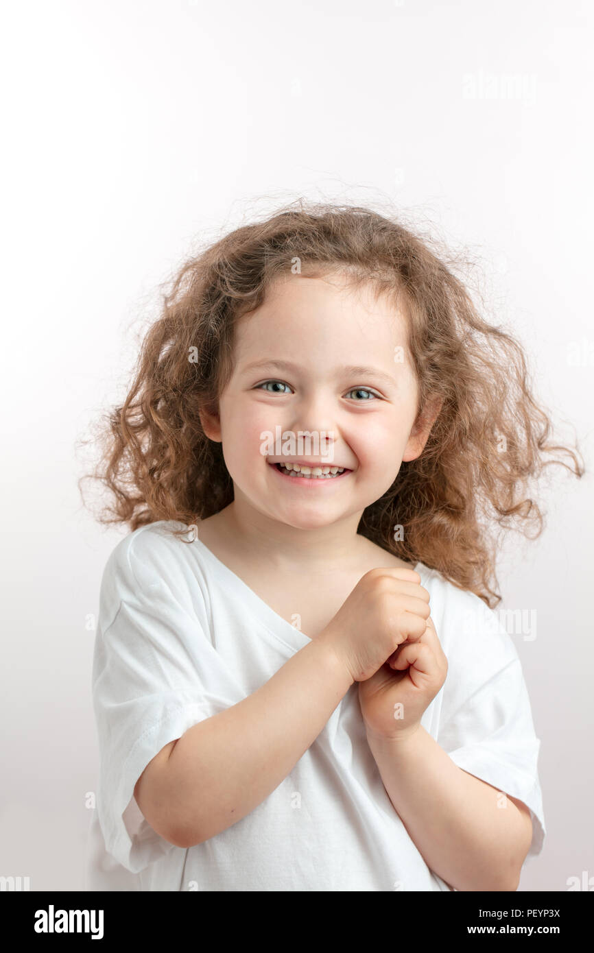 Positive Red Haired Kid Posing To The Camera Healthy Child In