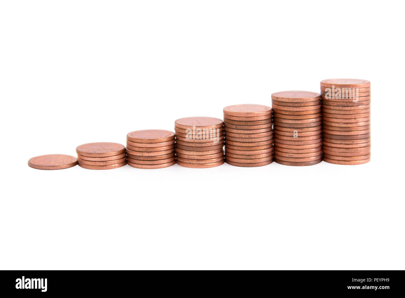 Stacks of copper coins isolated on white background with clipping path Stock Photo