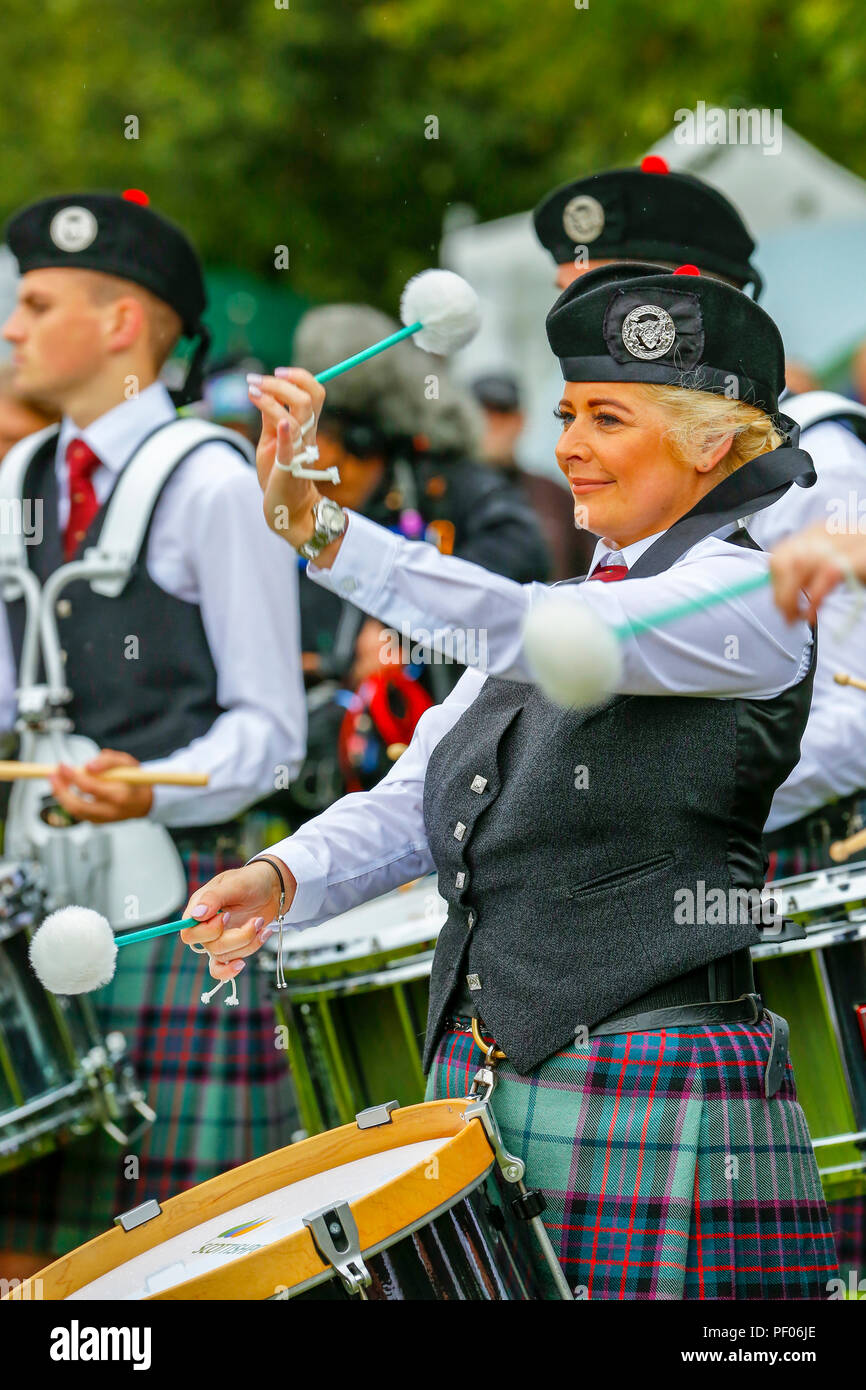 The finals of the World Pipe Band Championships was held at Glasgow Green in the city centre and the competition attracted many international and highly acclaimed pipe bands as well as thousands of tourists and spectators who came to support the event. Despite the occasional shower of rain, once again the event was a success and a great promotion for bagpipe music. Drummer with Scottish Power pipe band Stock Photo