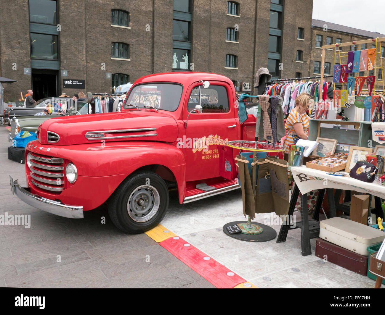 London, UK. 18th August 2018. Market Stall and Classic cars at ' Classic Car Boot Sale' at Granary Sq Kings Cross London UK 18/08/2018 Credit: Martyn Goddard/Alamy Live News Stock Photo