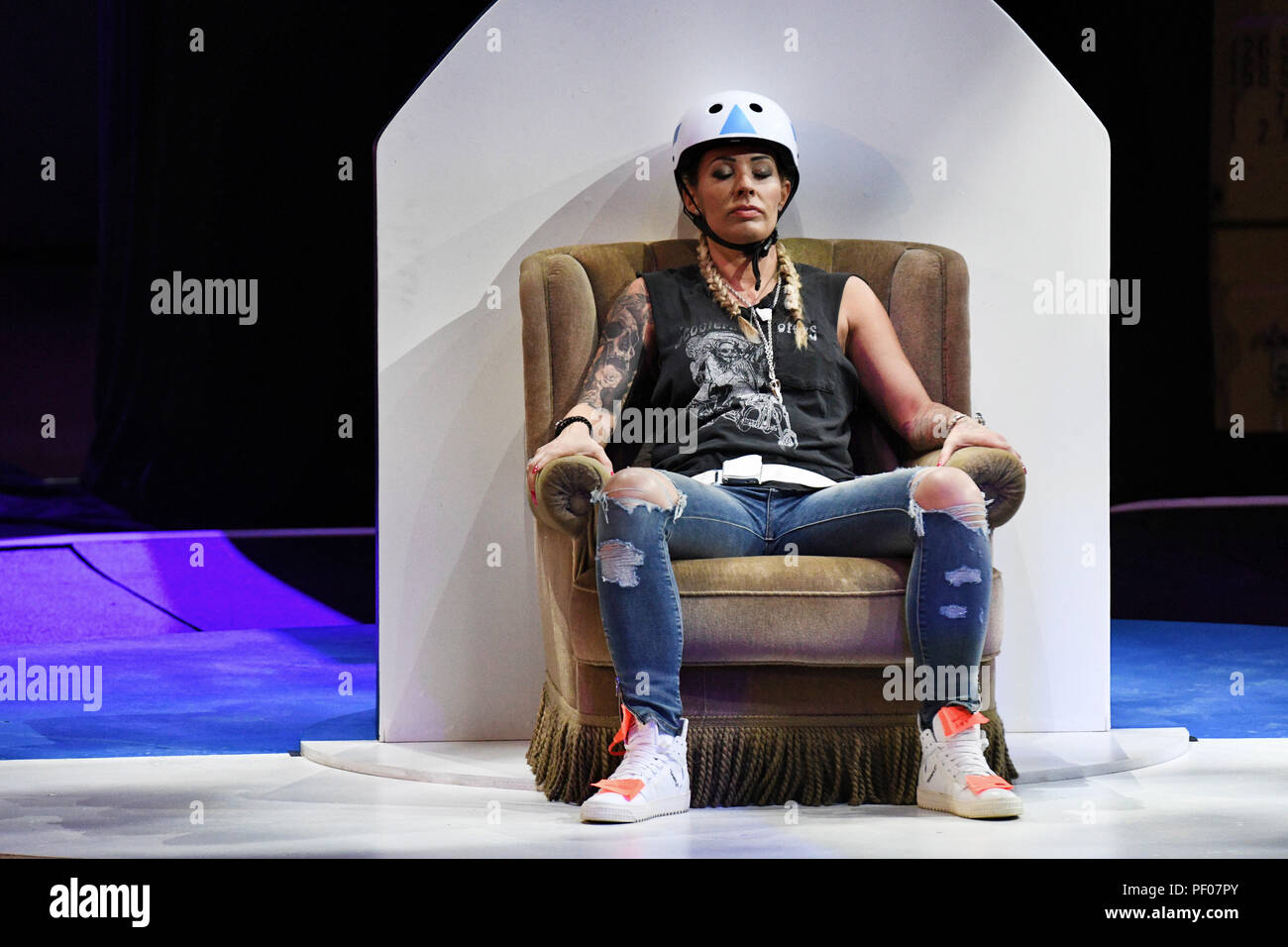 Cologne, Germany. 17th Aug, 2018. Cora Schumacher sits on stage at the opening show of the new season of the Sat.1 reality show 'Promi Big Brother'. Credit: Henning Kaiser/dpa/Alamy Live News Stock Photo
