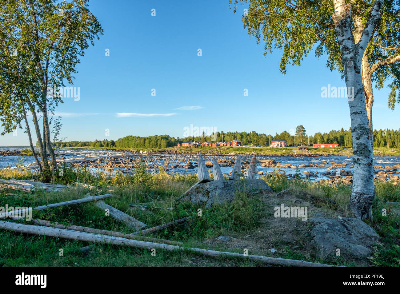 View from the Swedish side of Kukkola rapids across Torne river towards Finland Stock Photo