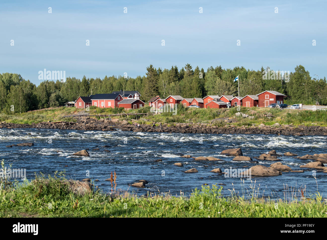 View from the Swedish side of Kukkola rapids across Torne river towards Finland Stock Photo
