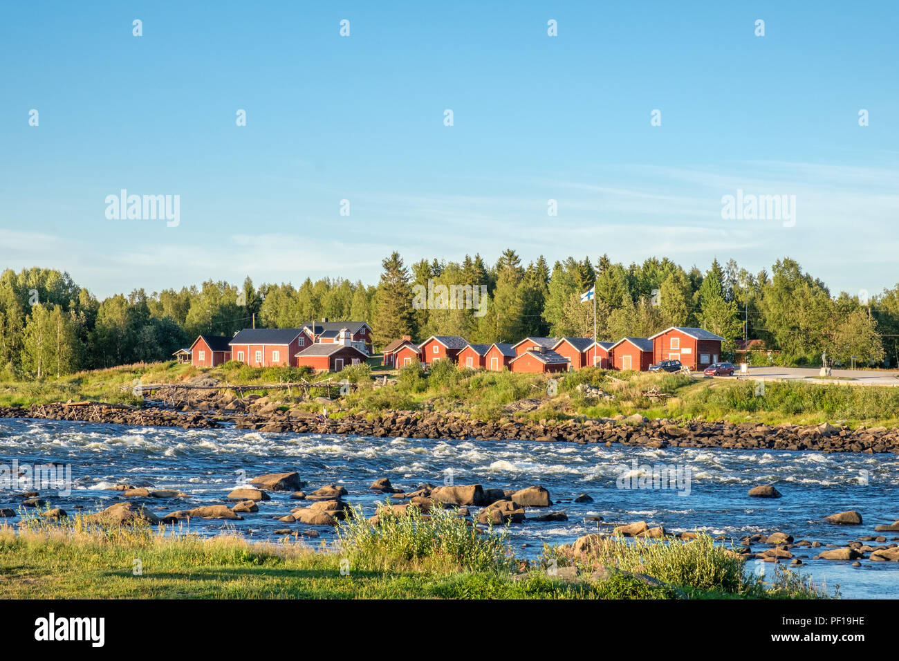 View from the Swedish side of Kukkola rapids across Torne river towards Finland Stock Photo