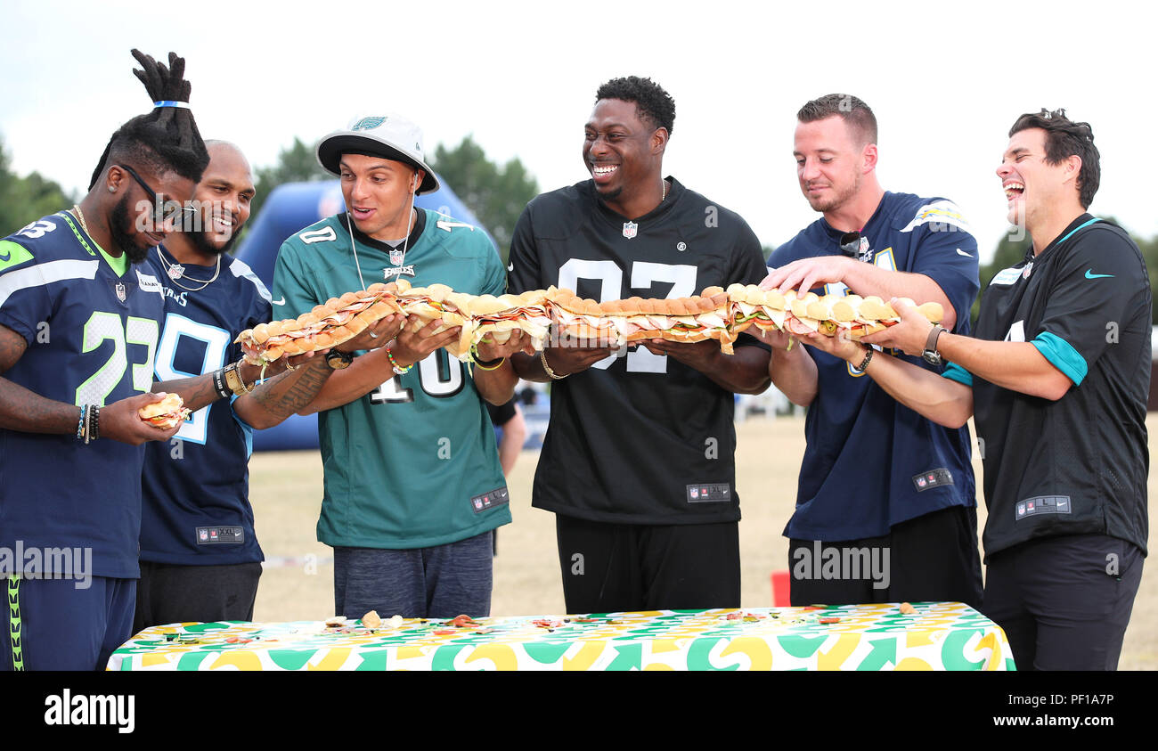 NFL London Games players Neiko Thorpe (SEATTLE SEAHAWKS), Jurrell Casey (TENNESSEE TITANS), Mack Hollins (PHILADELPHIA EAGLES), Jared Cook (OAKLAND RAIDERS), Kyle Emanuel (LOS ANGELES CHARGERS) and Josh Lambo (JACKSONVILLE JAGUARS) pictured at the NFL Flag Summer Bowl finale, presented by Subway, celebrate the 2017-2018 tournaments, played by over 10,000 kids across the UK. Schools can register interest online at http://bit.ly/NFLFlagSubway  Featuring: Atmosphere Where: London, United Kingdom When: 18 Jul 2018 Credit: Joe Pepler/PinPep/WENN.com Stock Photo