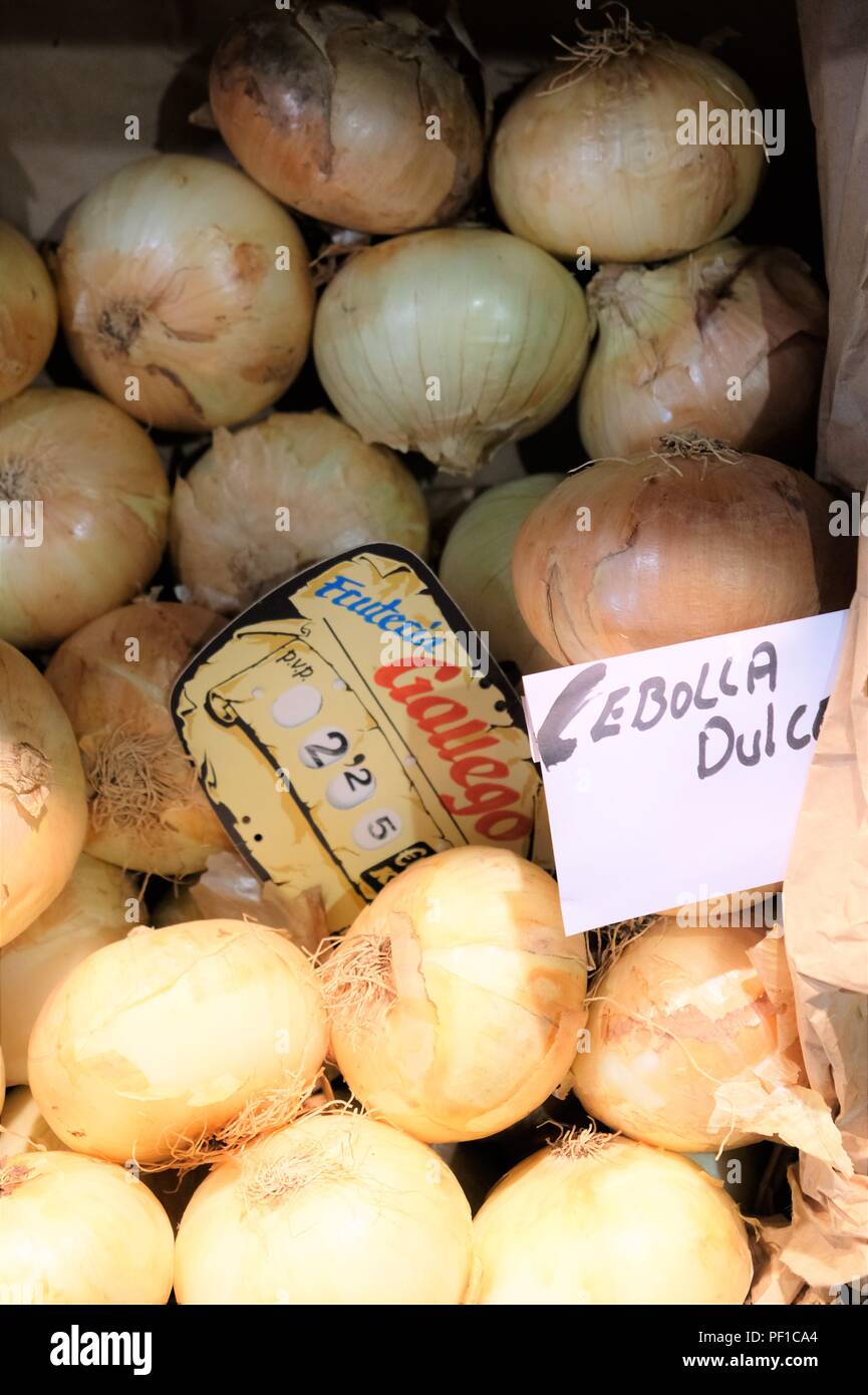 Onions on a market shelf Stock Photo