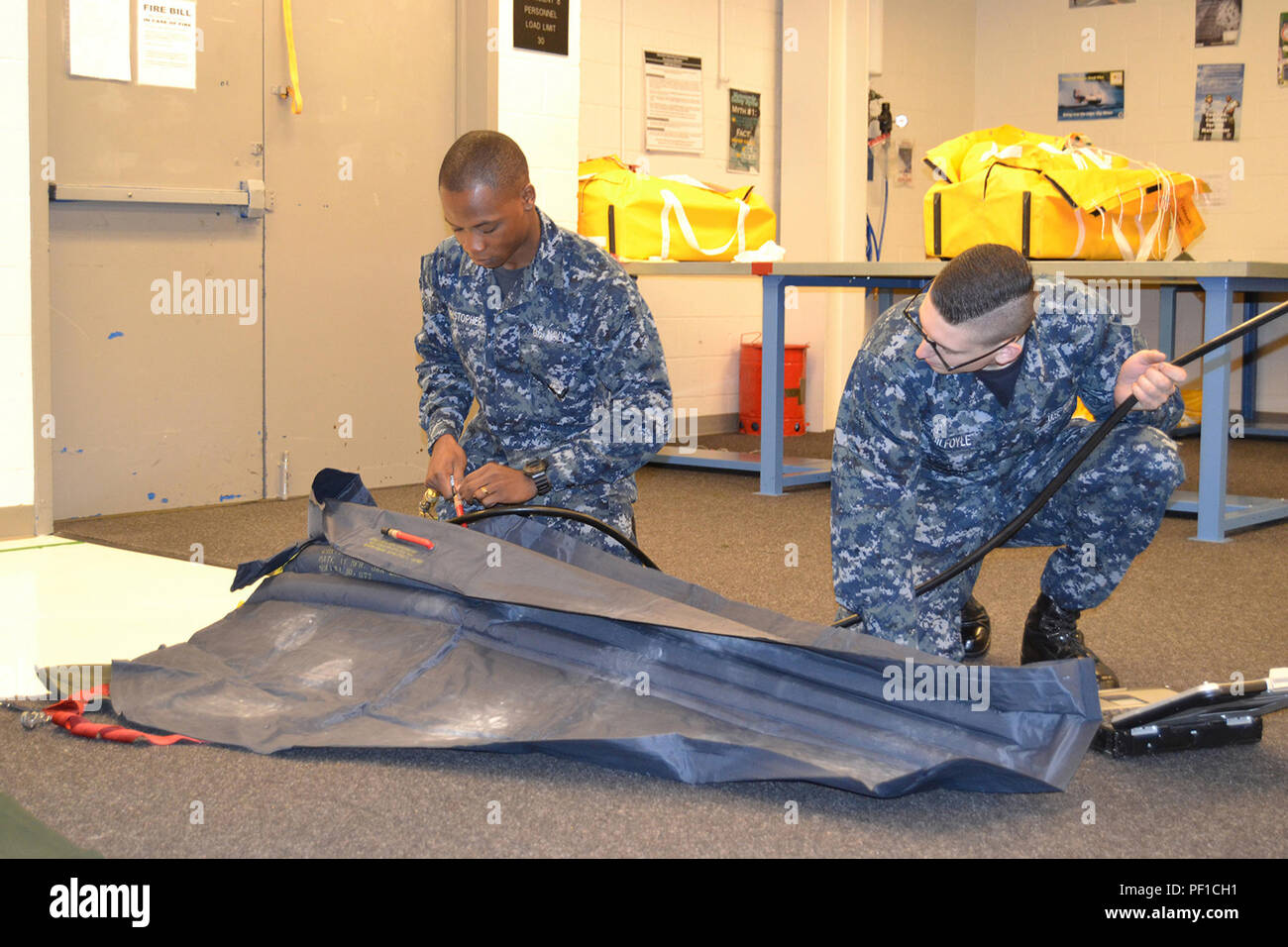 One Man Life Raft Inflation 160218-N-BO364-003 JACKSONVILLE, Fla. (Feb. 18, 2016) Aircrew Survival ...