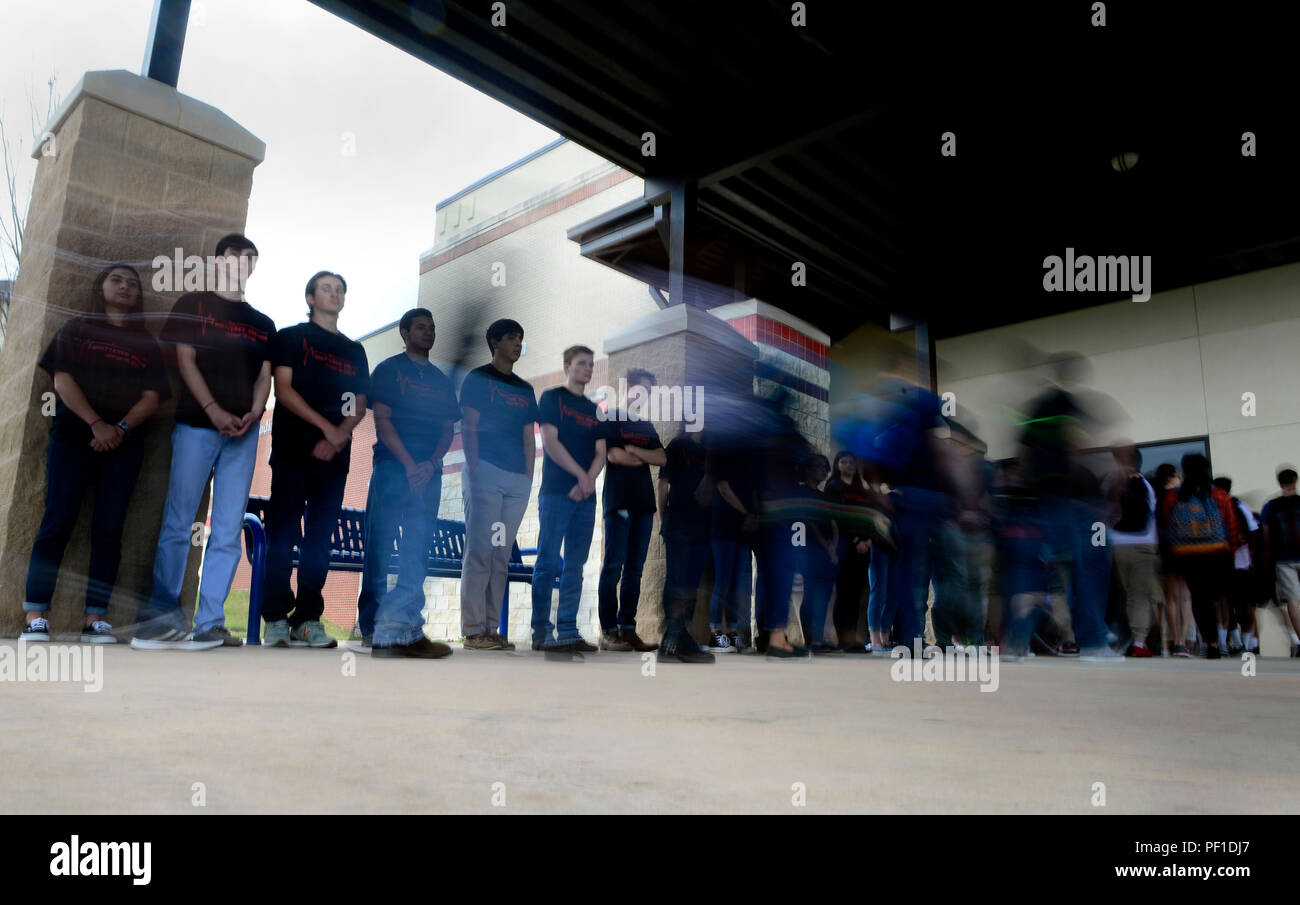 Students from Johnson High School file into the auditorium for a mock memorial service during the Johnson HS Shattered Dreams event, San Antonio, Feb. 18, 2016. Shattered Dreams is an educational program designed to prevent problems resulting from drinking while driving. Fellow students portray the victims and visually engage their peers to consider the gravity of the issue, and promote responsible decision making. Volunteers from Joint Base San Antonio-Lackland, Wilford Hall Ambulatory Services Center and local first-responders also participated in the event. (U.S. Air Force photo by Staff Sg Stock Photo