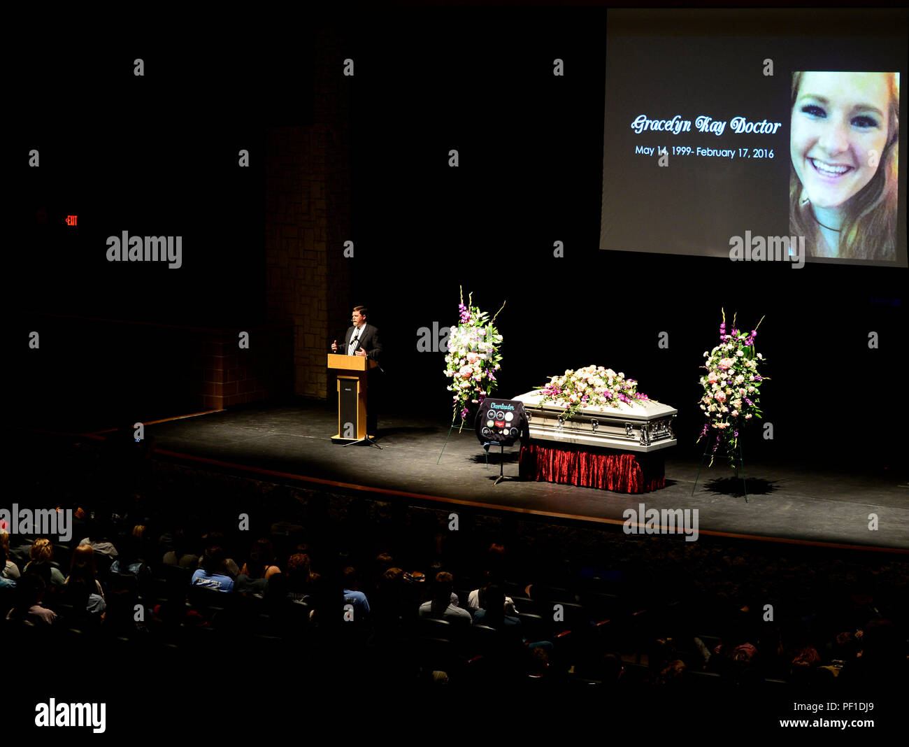 Tom Masterson, minister for Hope Church, delivers a eulogy for a student who was acting as a drunk driving accident victim, during a mock memorial service during the Johnson High School Shattered Dreams event, San Antonio, Feb. 18, 2016. Shattered Dreams is an educational program designed to prevent problems resulting from drinking while driving. Fellow students portray the victims and visually engage their peers to consider the gravity of the issue, and promote responsible decision making. Volunteers from Joint Base San Antonio-Lackland, Wilford Hall Ambulatory Services Center and local first Stock Photo