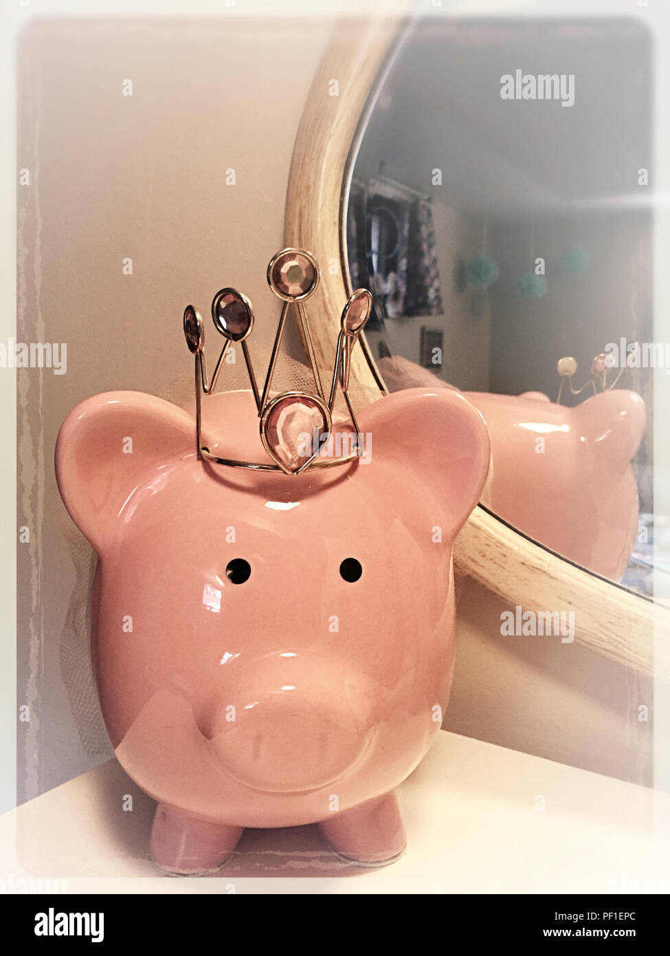 Pink Piggy Bank with Crown, USA Stock Photo