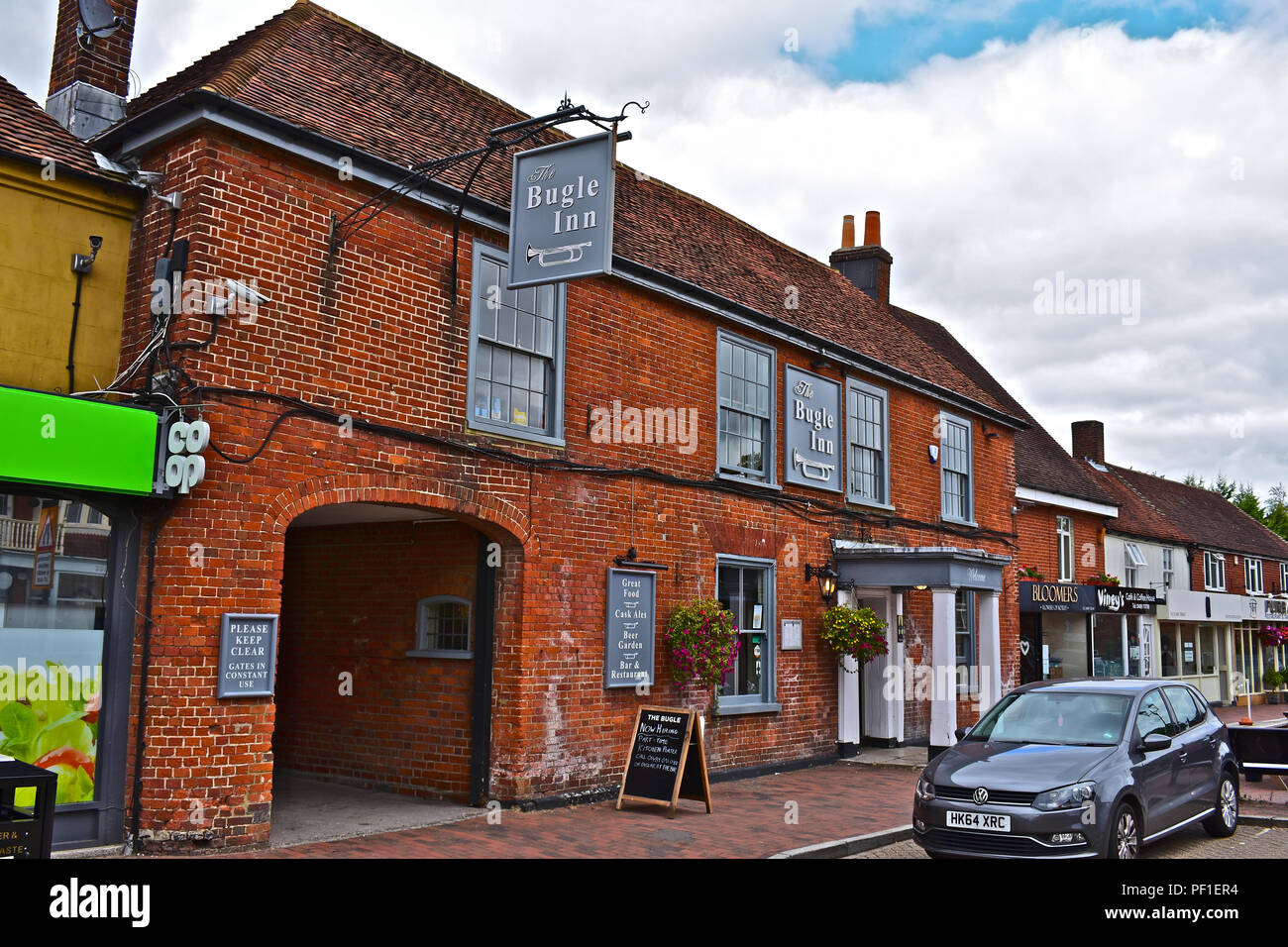 The traditional Bugle Inn, is an old coaching inn which is located in the historic village of Botley, near Southampton. Stock Photo