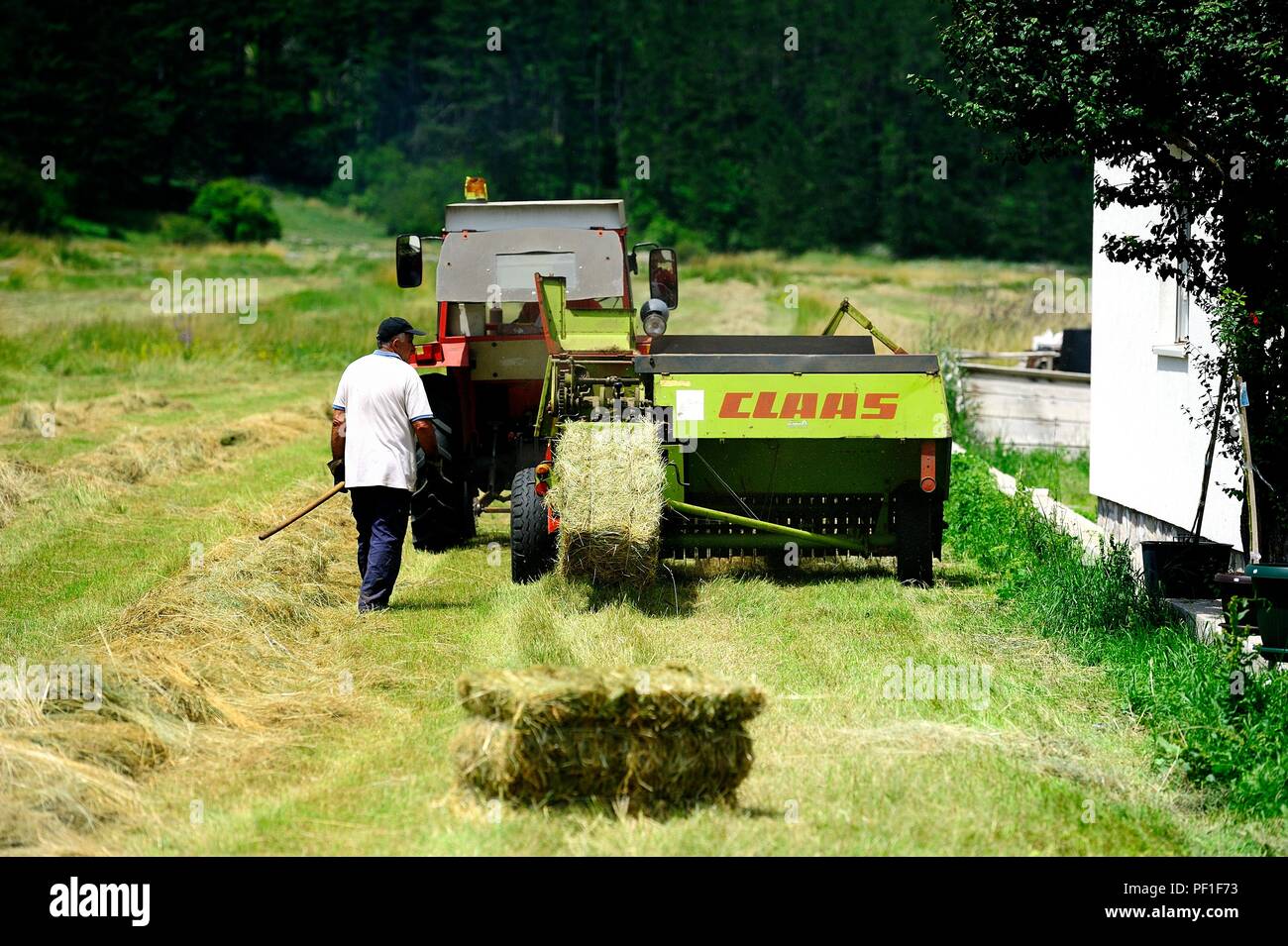 Red baling machine hi-res stock photography and images - Alamy