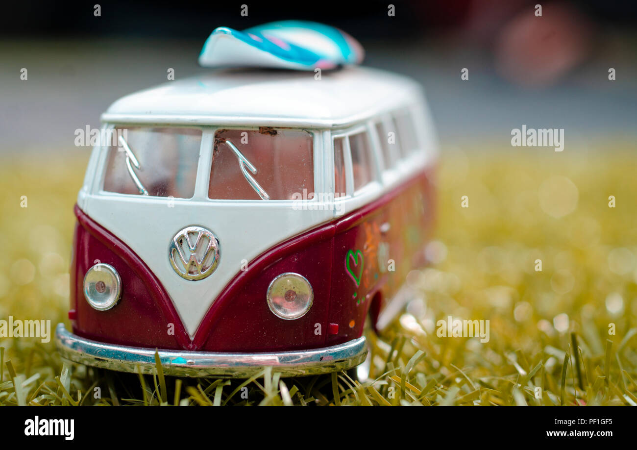 Model of a VW Volkswagen Camper Van with Surfboard, The Type T2 Split Screen was first introduced in 1950 Stock Photo