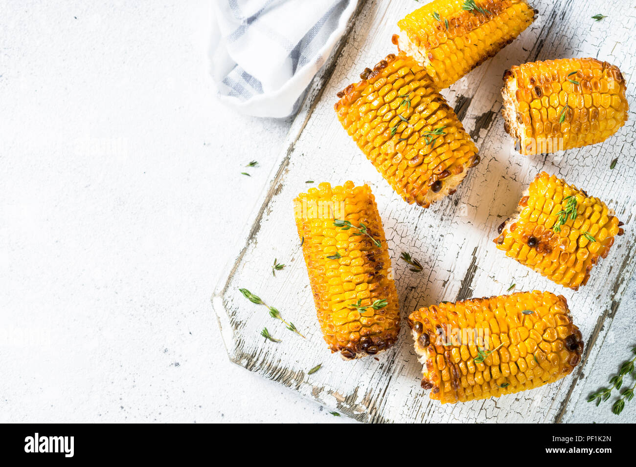 Grilled corn with spices top view on white Stock Photo Alamy