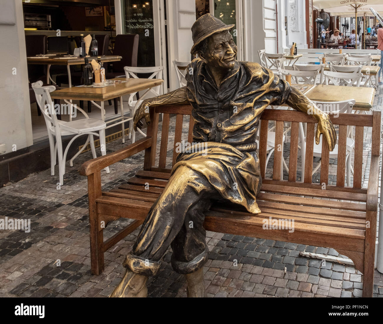 Statue Man Sitting On Bench High Resolution Stock Photography and