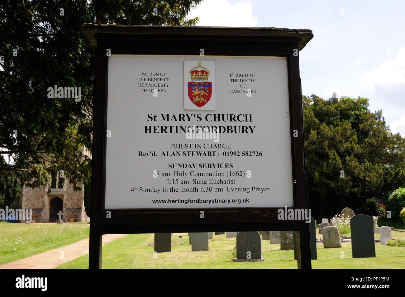 The Church sign, St Marys Church, Hertingfordbury,   Hertfordshire, tells us that the Patron of the Benefice is Her Majesty Stock Photo