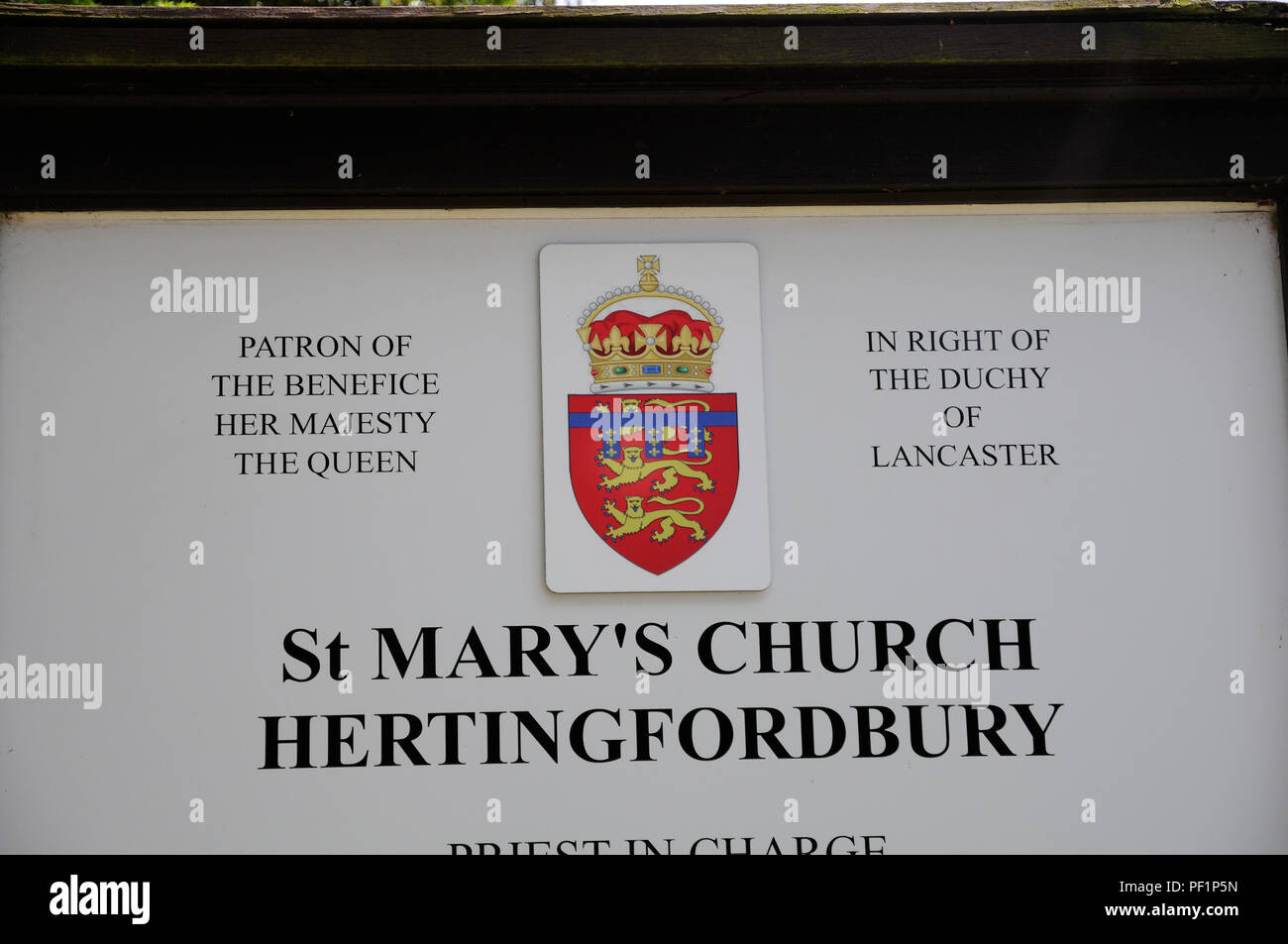 The Church sign, St Marys Church, Hertingfordbury,   Hertfordshire, tells us that the Patron of the Benefice is Her Majesty the Queen Stock Photo