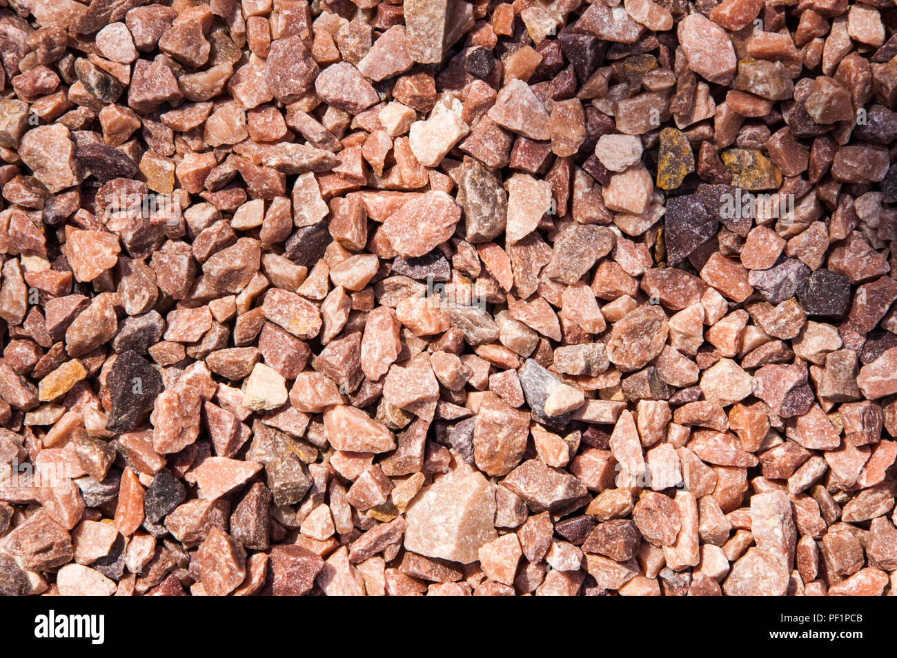 red gravel texture macro shot Stock Photo Alamy