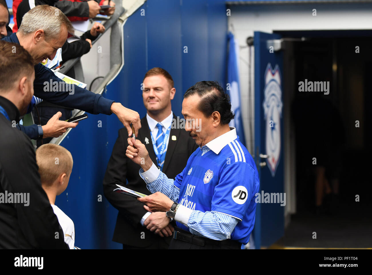 Cardiff City Owner Vincent Tan Signs Autographs Before The Premier League Match At The Cardiff City Stadium Stock Photo Alamy