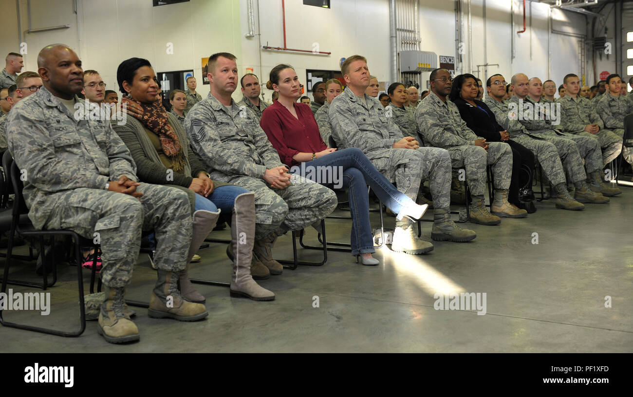 The 86th Airlift Wing leaders, their families and Airmen watch as families receive awards during a Homefront Heroes ceremony Feb. 19, 2016, at Ramstein Air Base, Germany. The event is the first of its kind on Ramstein and was hosted by the 86th Logistics Readiness Group. (U.S. Air Force photo/Airman 1st Class Larissa Greatwood) Stock Photo