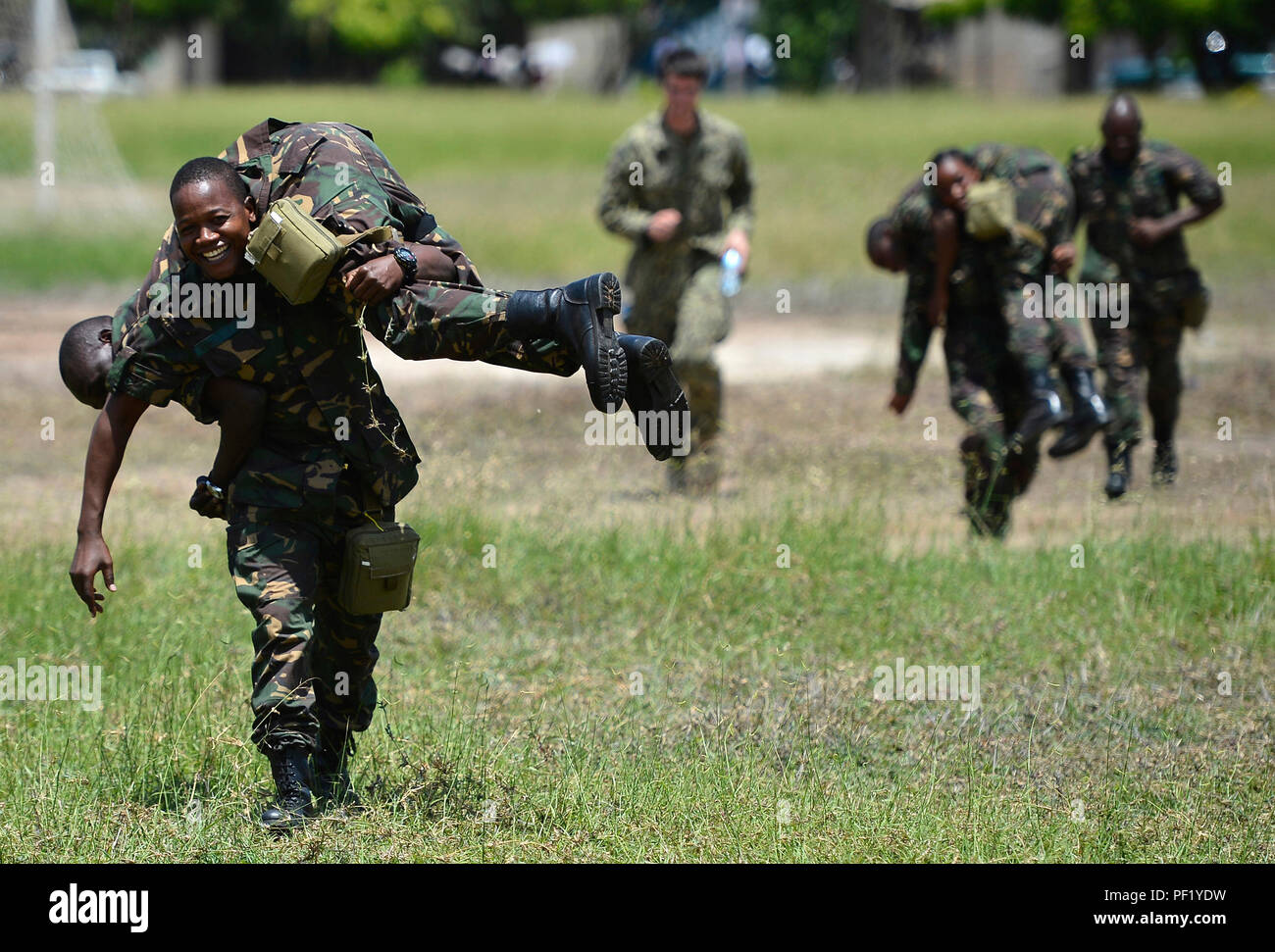 Members of the Tanzania People's Defence Force practice carries as part ...