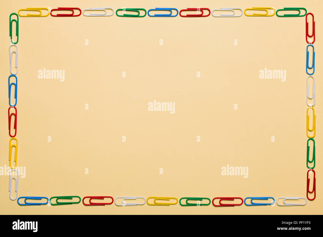 A sheet of paper with a frame of paper clips Stock Photo Alamy