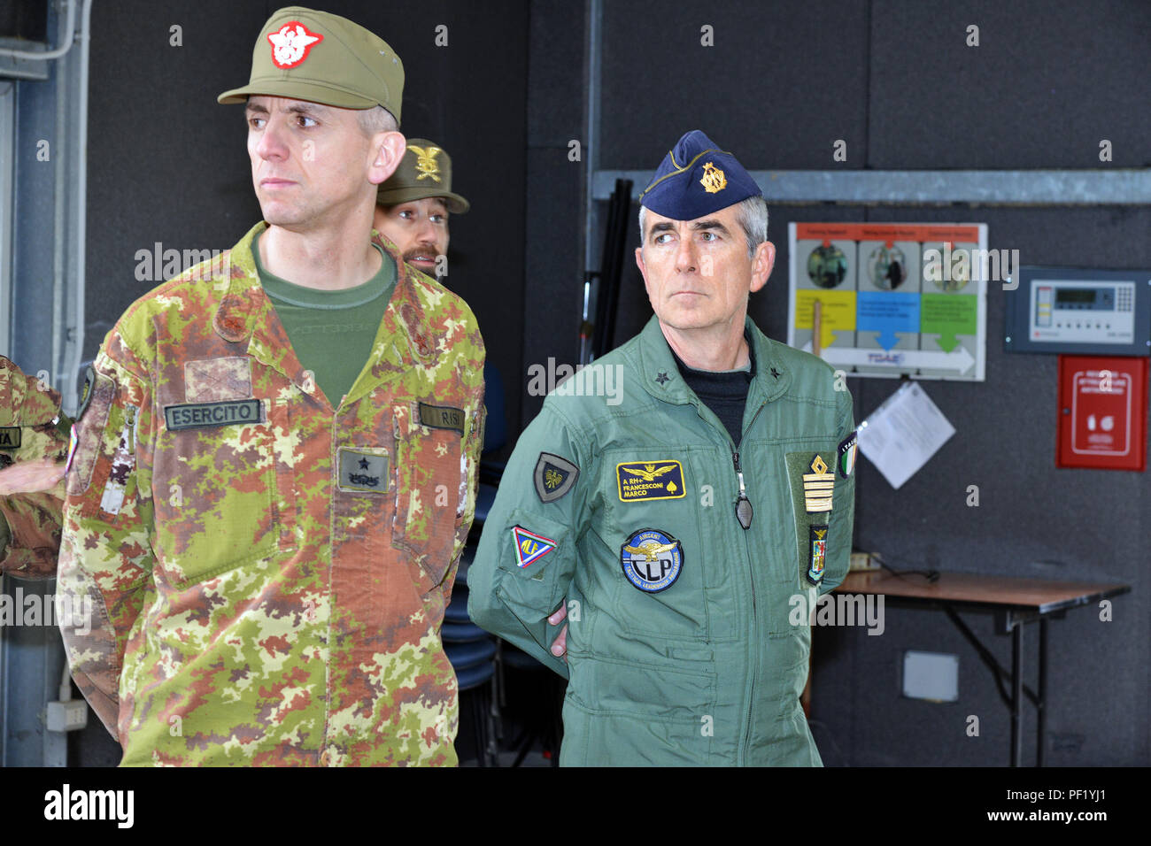 Italian Army Brig. Gen. Michele Risi, Multinational Land Force “Julia” Alpine Brigade Commander (left), Col. Marco Francesconi, Italian Air Force, Liaison Officer to “Julia” Brigade (right), tour the RTSD South in Caserma Ederle, Vicenza, Italy, February 24, 2016. Italian Army visit U.S. Army RTSD South, in order to enhance to bilateral relations and to expand levels of cooperation and the capacity of the personnel involved in joint operations. (Photo by Visual Information Specialist Paolo Bovo/Released) Stock Photo