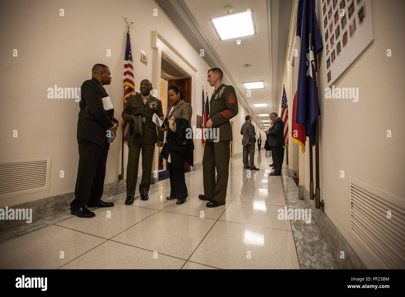The 18th Sergeant Major of the Marine Corps, Ronald L. Green, speaks with members of the Committee on Appropriations, Military Construction, U.S. House of Representatives, at Capitol Hill, Washington D.C., Feb. 23, 2016. Sgt. Maj. Green was making final preparations prior to his testimony on the quality of life within the Marine Corps. (U.S. Marine Corps photo by Sgt. Melissa Marnell, Office of the Sergeant Major of the Marine Corps/Released) Stock Photo