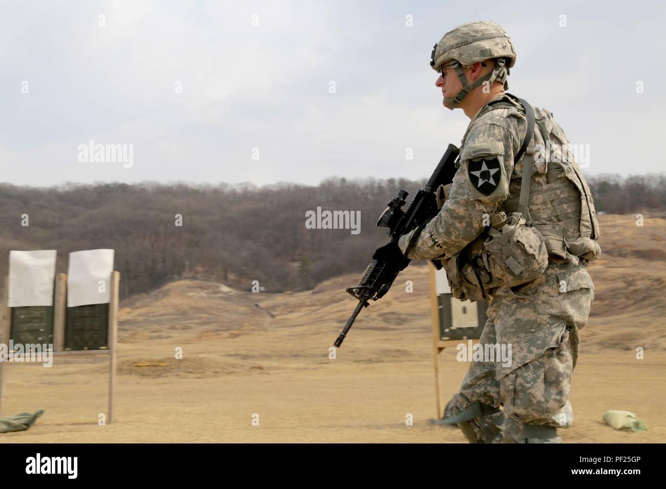 Capt. Adam Dotts, the company commander for Company A, 2nd Battalion, 3rd Infantry Regiment, 1-2 Stryker Brigade Combat Team, participates in short-range marksmanship at Story Live Fire Complex, South Korea. Dotts was in Korea with his unit to take part in Foal Eagle 2016. Foal Eagle was the second exercise for the Soldiers of 1-2 SBCT in their Operation Pacific Pathways deployment. (U.S. Army photo by Pfc. Noel Toye) Stock Photo