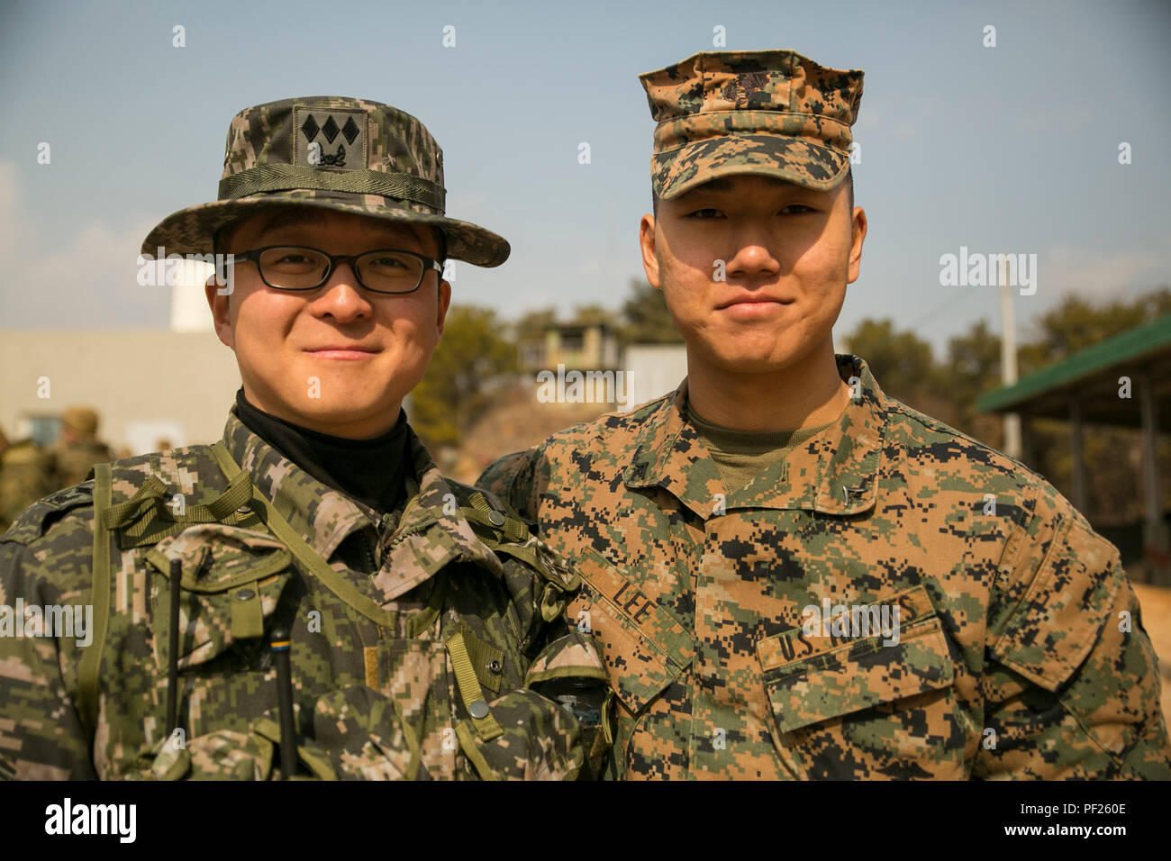 Republic of Korea Marine Captain Chae Soo Gyun poses with U.S. Marine
