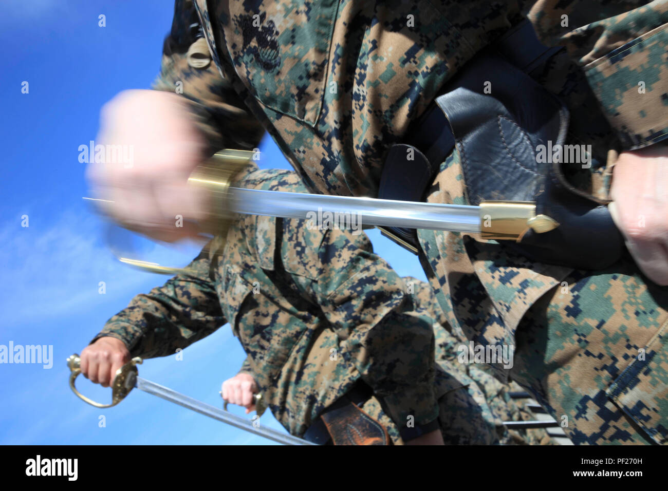 U.S. Marines practice proper sword manual during Corporals Course on